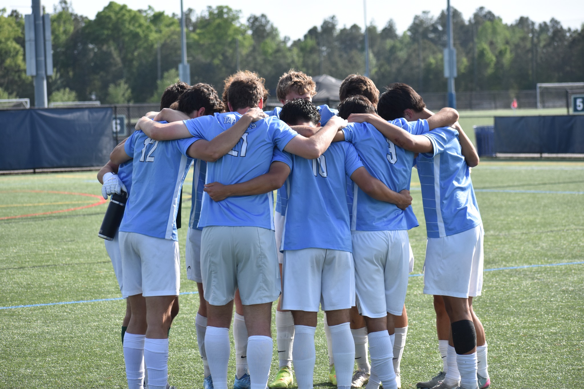 UNC players in a pregame huddle
